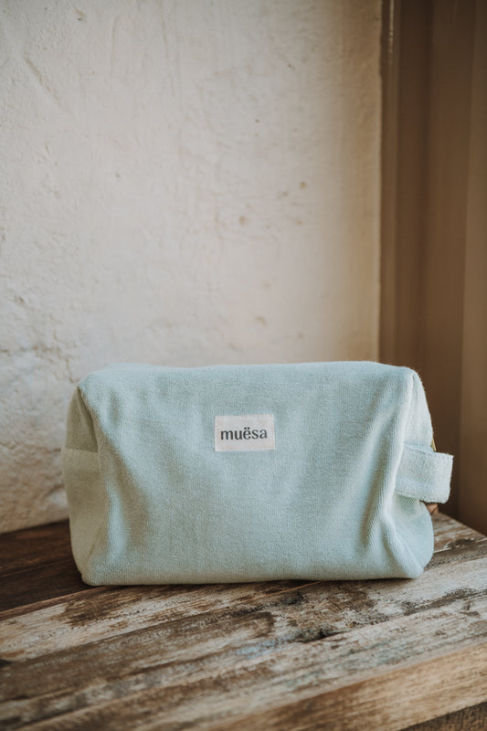 Trousse de toilette en éponge